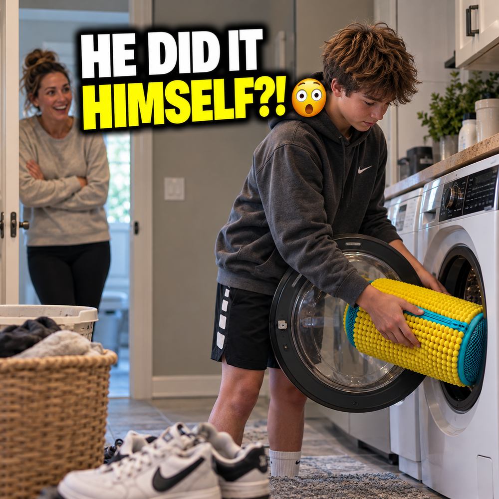 A teenage boy loading the FreshKicks bag into the washing machine while his mom watches from the doorway
